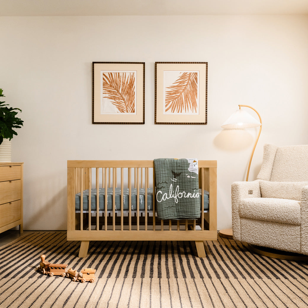 Babyletto Hudson 3-in-1 Convertible Crib And Toddler Rail with California quilt over rail in -- Color_Honey