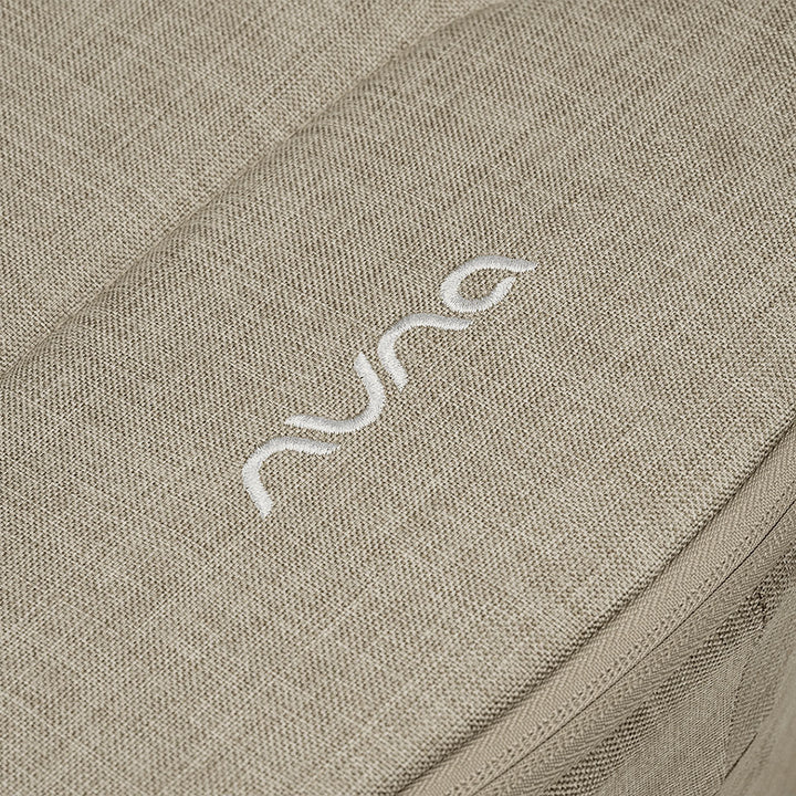 Closeup of material of the Nuna DEMI Next Bassinet + Stand in -- Color_Hazelwood