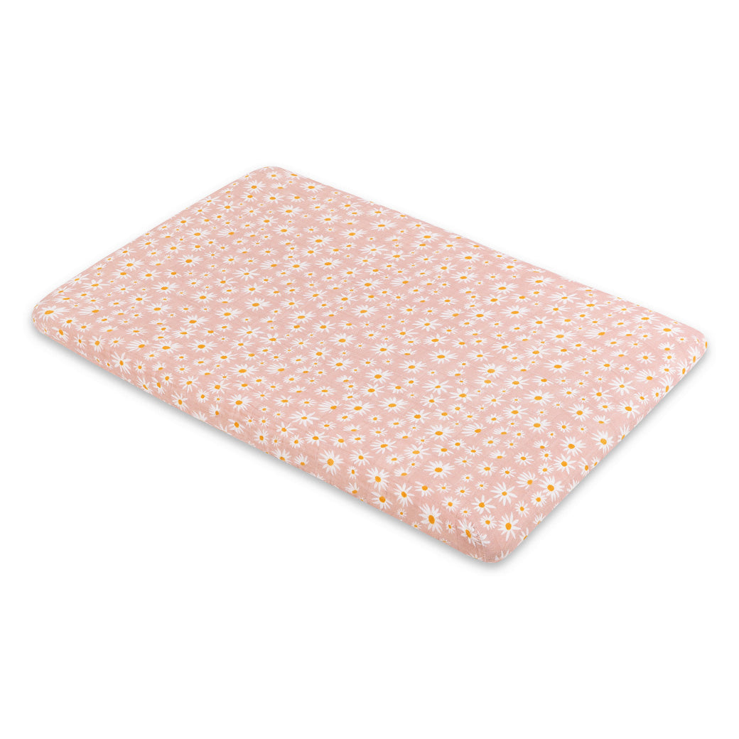 Full view of the Babyletto All-Stages Bassinet Sheet In GOTS Certified Organic Muslin Cotton in -- Color_Daisy