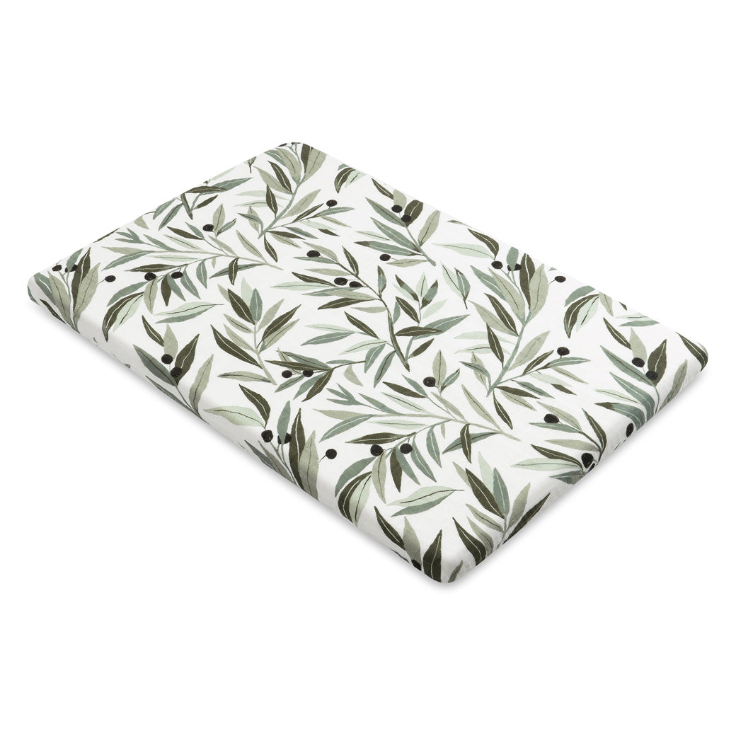 Full view of the Babyletto All-Stages Bassinet Sheet In GOTS Certified Organic Muslin Cotton in -- Color_Olive Branches