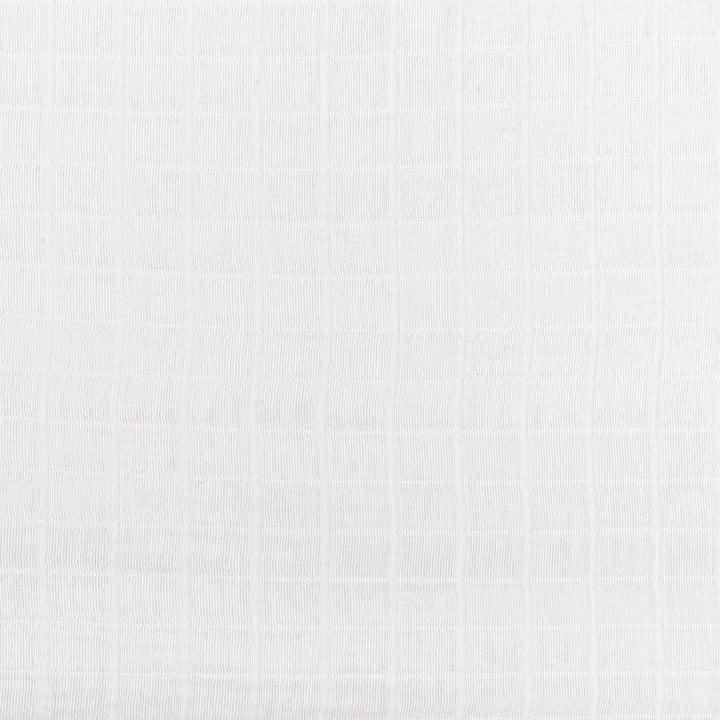 Closeup of the Babyletto All-Stages Bassinet Sheet In GOTS Certified Organic Muslin Cotton in -- Color_White