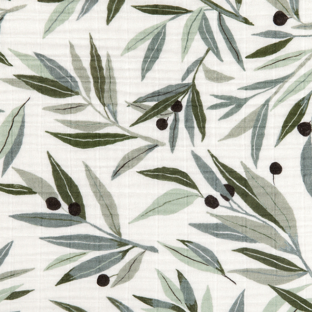 Closeup of Babyletto Quilted Changing Pad Cover In GOTS Certified Organic Muslin Cotton pattern in -- Color_Olive Branches