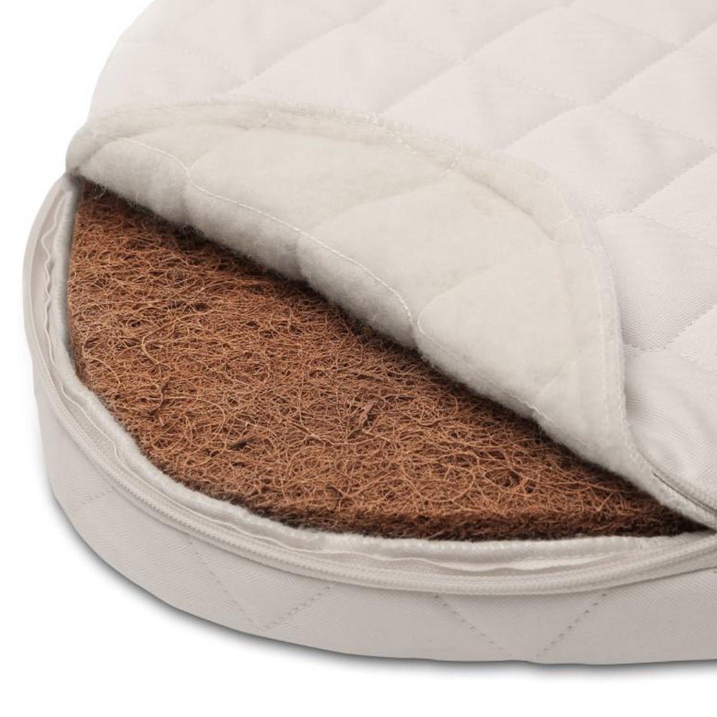 Inside of the Mattress for the Charlie Crane KUMI Cradle in Desert / Organic. Looks organic and comfortable -- Color_Desert / Organic