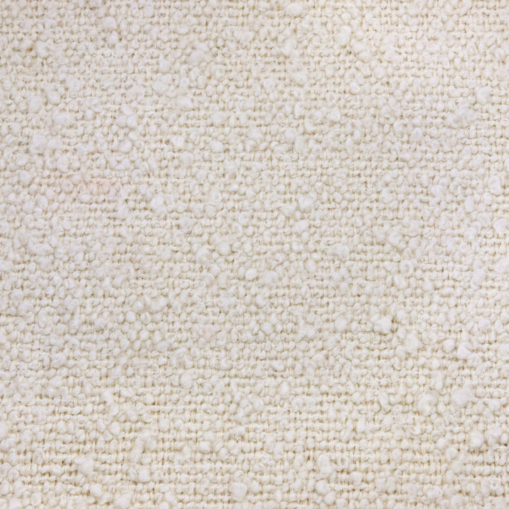 Closeup of The Nursery Works Solstice Swivel Glider pattern in --Color_Ivory Boucle with Ivory Wood Base