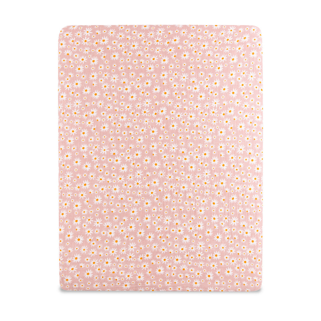 Front view of Babyletto's All-Stages Midi Crib Sheet In GOTS Certified Organic Muslin Cotton in -- Color_Daisy