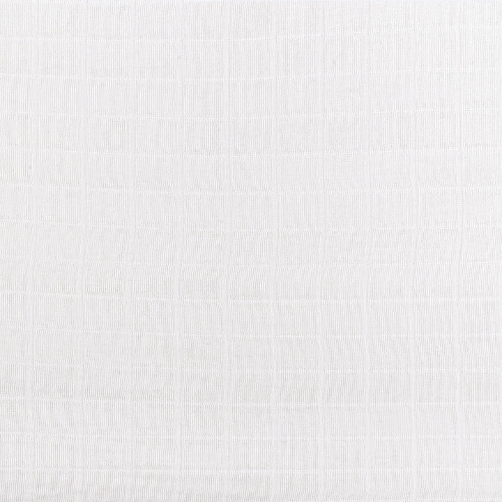 Closeup of pattern of Babyletto's All-Stages Midi Crib Sheet In GOTS Certified Organic Muslin Cotton in -- Color_White