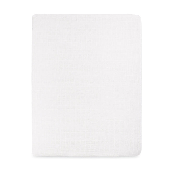 Front view of Babyletto's All-Stages Midi Crib Sheet In GOTS Certified Organic Muslin Cotton in -- Color_White